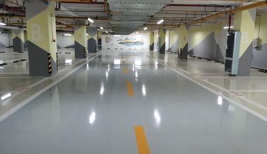 秀珀浮動彩砂自流平地坪，傾力裝扮武漢光谷生物醫(yī)藥創(chuàng)新中心地下車庫